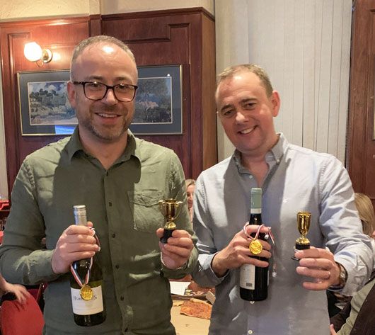 Partners Mark Gibson and Euan Love winners at Glasgow Office Charity Race Night 2019