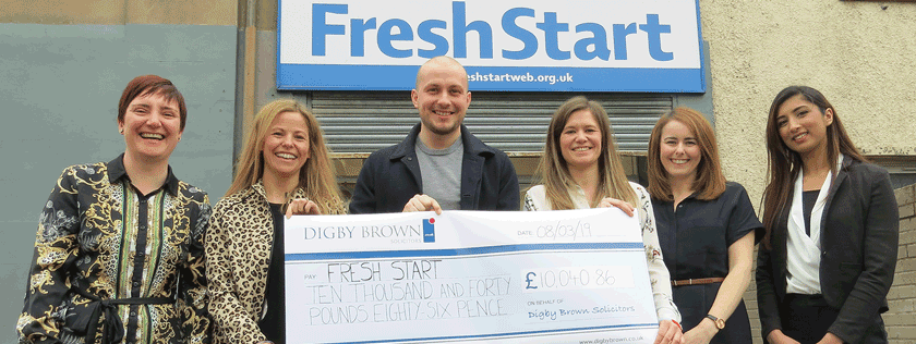 Cheque handover outside FreshStart