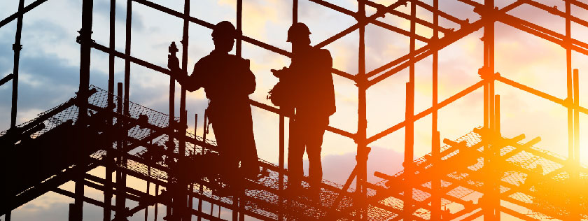 Workers up scaffolding