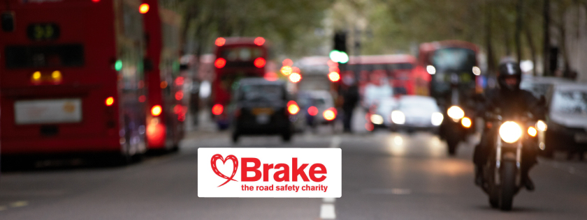 Cars, buses and motorbike traffic in town