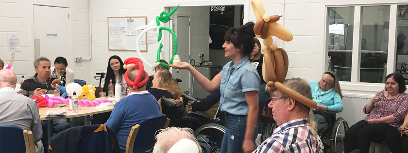 Headway Edinburgh with balloonist entertainer at summer BBQ 2019