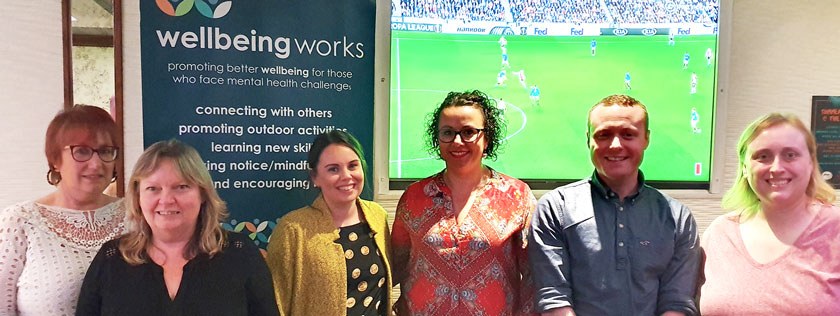 Wellbeing Works with Digby Brown Dundee staff at charity quiz