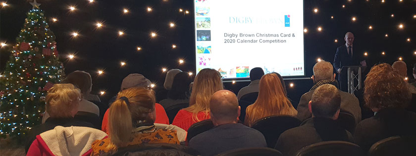 Chris Stewart welcoming Christmas Card and 2020 Calendar winners at awards ceremony in Glasgow
