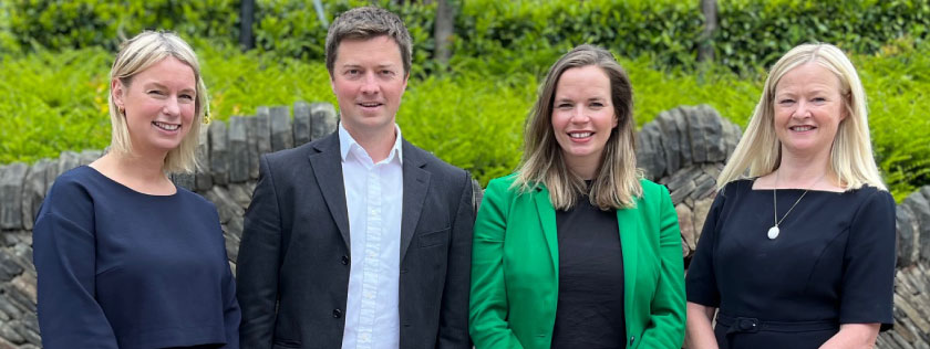 Four of Digby Brown's new partners standing next to each other.