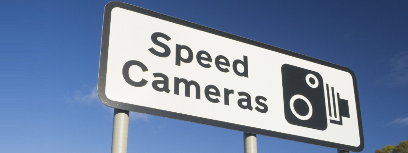 Speed camera warning sign