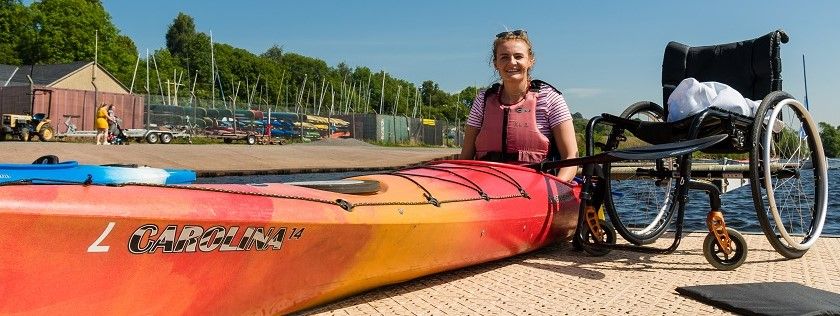 SIS member in canoe at SIS bbq 2018
