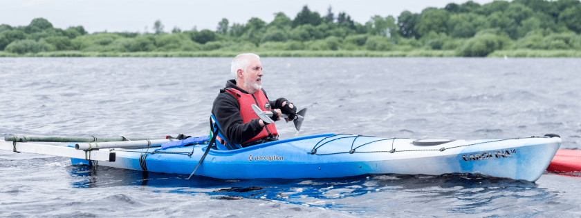 Man Kayaking at Spinal Injuries Scotland Activities Day