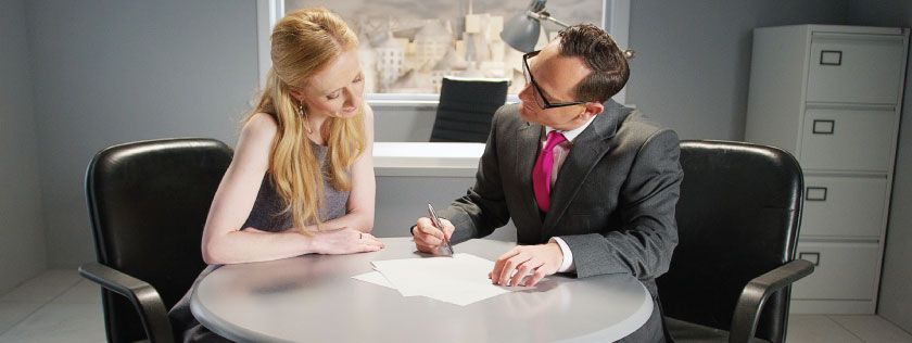 Woman getting advice from solicitor