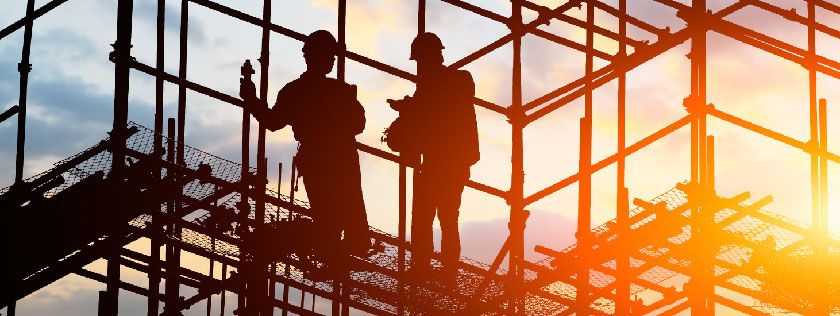 Workers up scaffolding