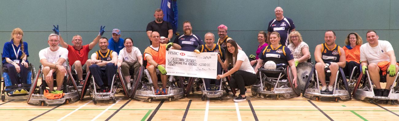 Caledonian Crushers receiving cheque 2019