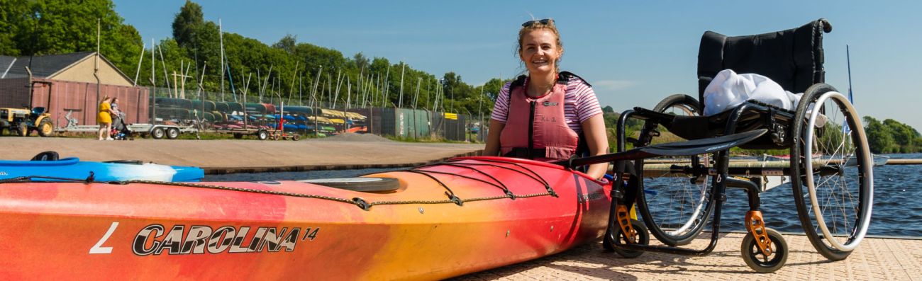 Woman with spinal injury in canoe