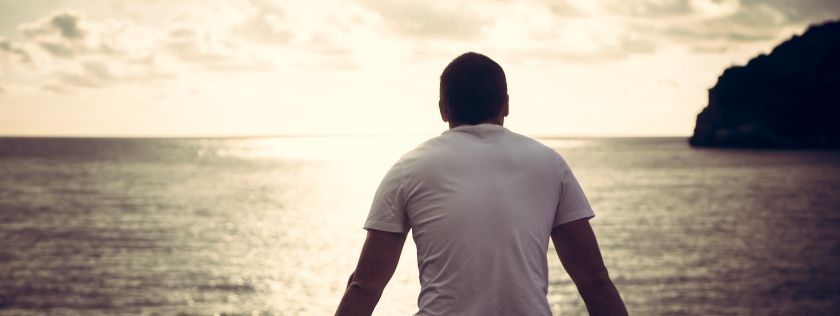 Man looking out to sea