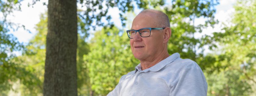 Man in park on bench