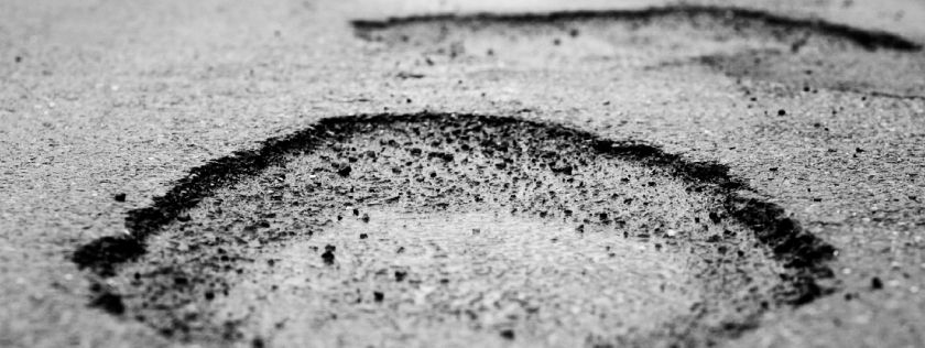 Pot holes in the road