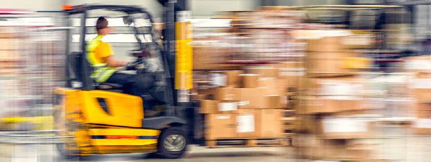 Forklift in warehouse