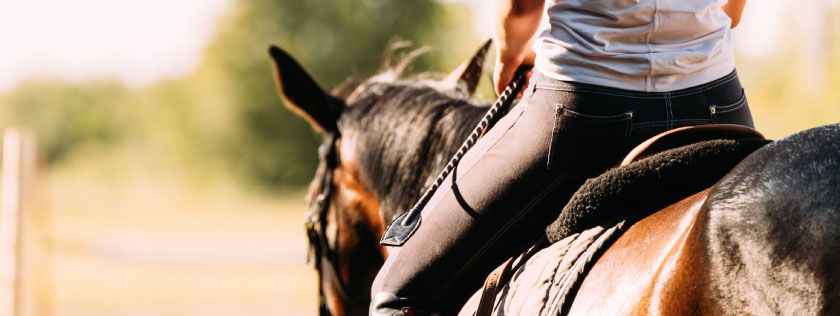 Woman riding a horse