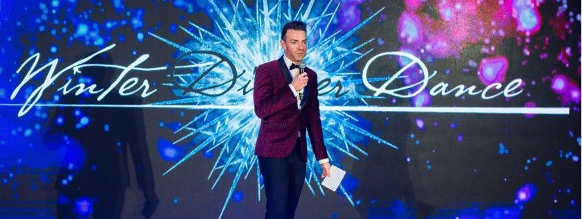 Des Clarke, compere on stage at Digby Brown Winter Dinner Dance 2019 for Spinal Injuries Scotland