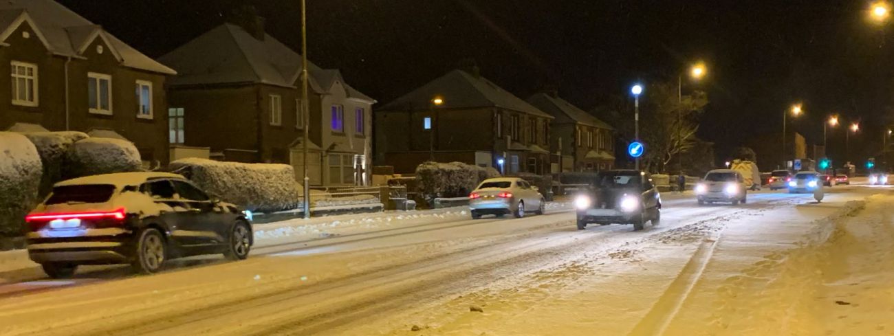 Cars driving in snowy conditions