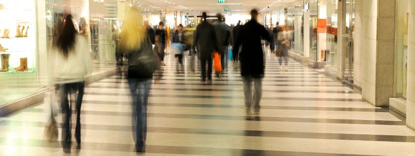 People walking through a shopping centre