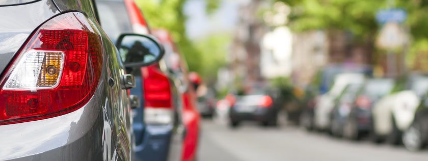 Cars parked along a street