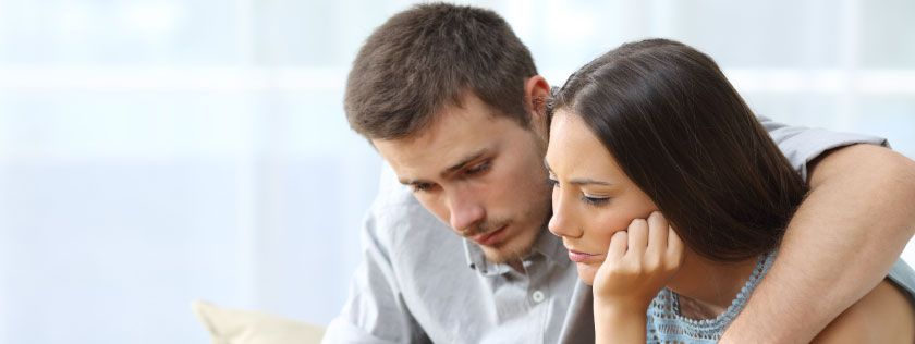 Young couple looking thoughtful