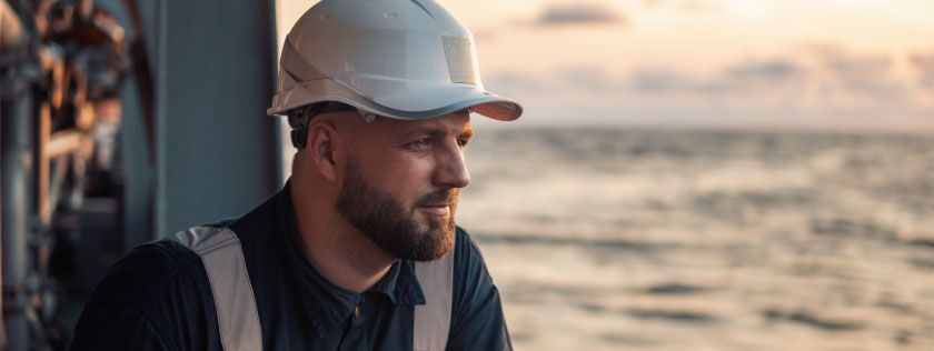 Offshore worker looking out to sea