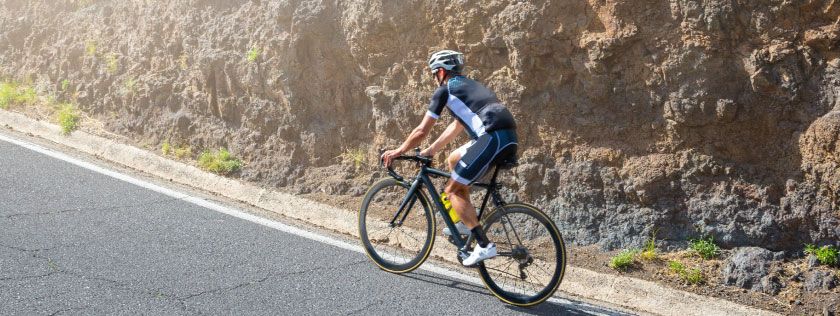 Man cycling abroad on the road