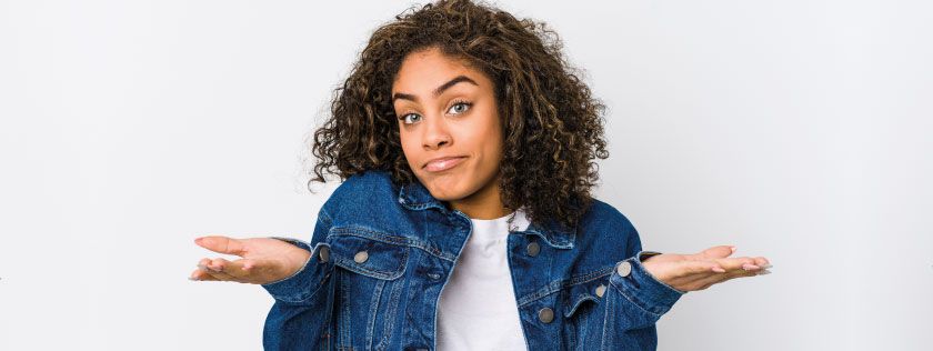 Lady shrugging asking question