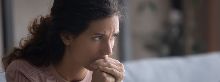 Woman looking thoughtful