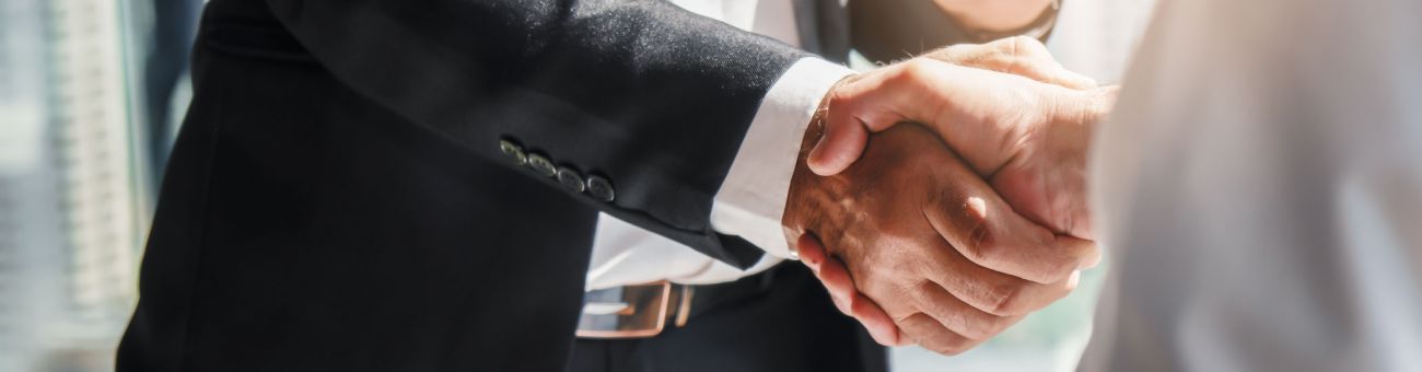 Business people shaking hands