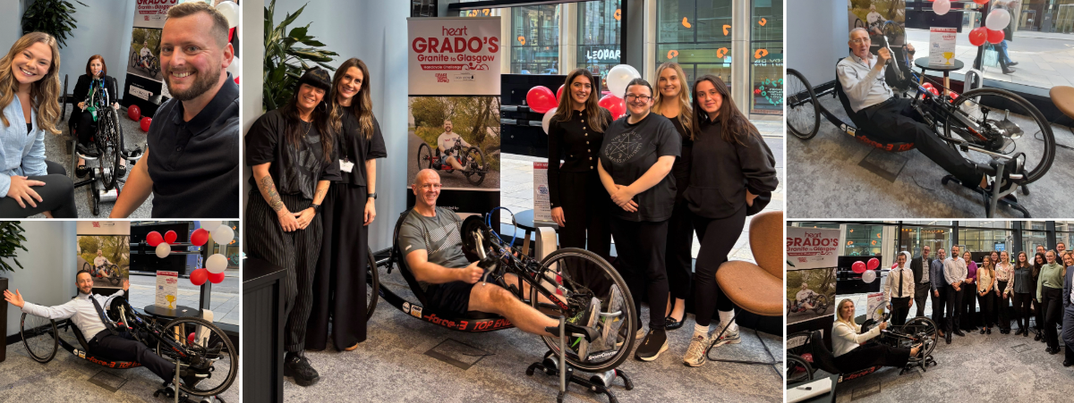 Digby Brown staff on a stationary handcycle