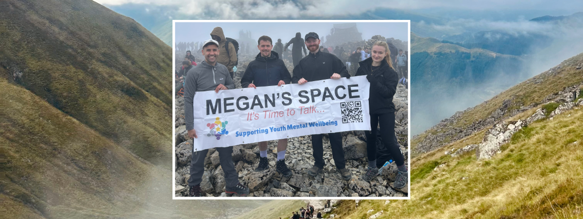 Four colleagues from our Ayr office pictured at the summit of Ben Nevis holding a banner for their local office charity Megan's Space