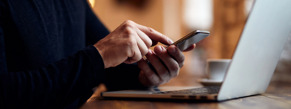 Person typing on a mobile phone