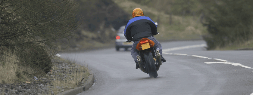 Motorcycle on Country Road in Scotland