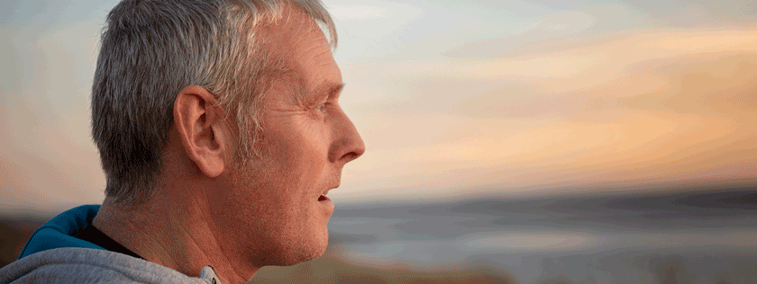 Man looking out to sea