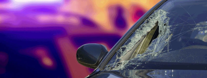 Smashed windscreen of car
