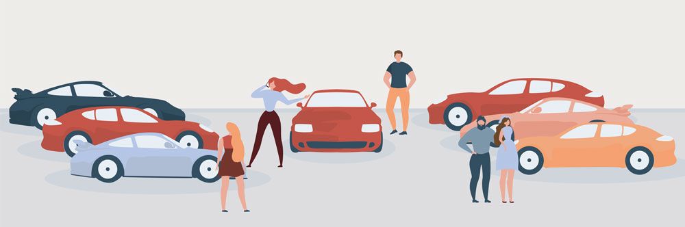 People in car garage choosing car