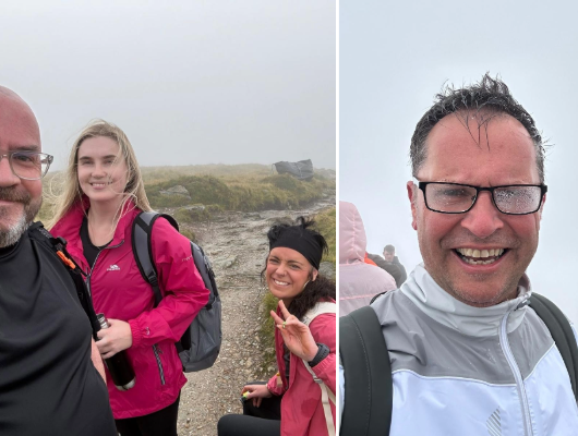 Glasgow staff climbing Ben Lomond in the rain