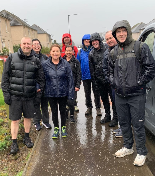 Asbestos lawyers tackle wind and rain on Castle to Kelpies walk