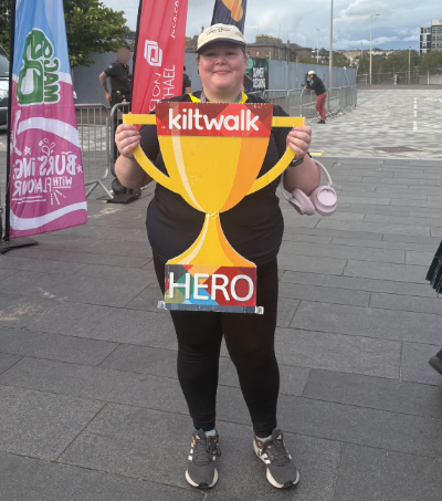 Shannon crossing the finish line