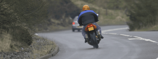 Motorcycle on Country Road in Scotland