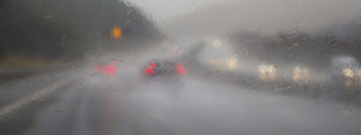 Cars on a motorway in rain