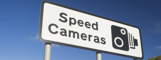 Speed camera warning sign