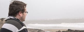 Man looking out to sea