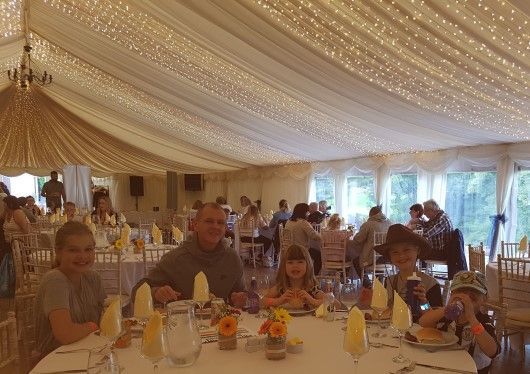 Chris Stewart, Serious Injury solicitor at Digby Brown, at dinner with guests at the Compass Brain Injury Specialists Ltd BBQ 