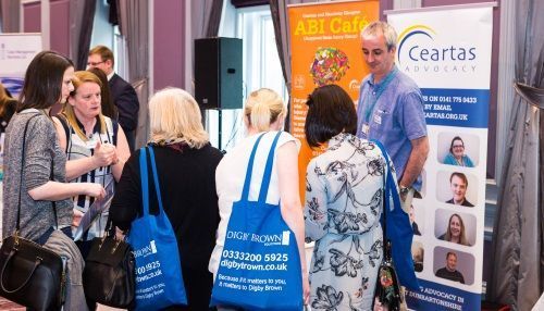 Head Injury Information Day Glasgow Exhibitors and Attendees speaking