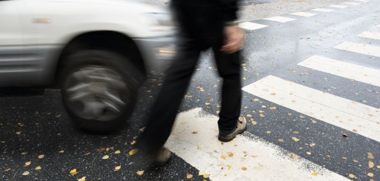 Pedestrian crossing the road