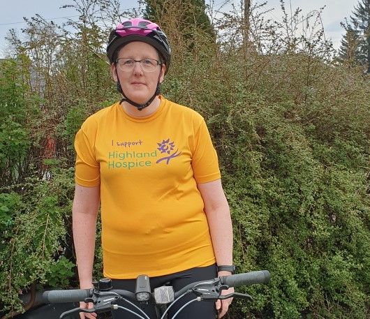 Sarah from the Inverness office in her cycling gear.