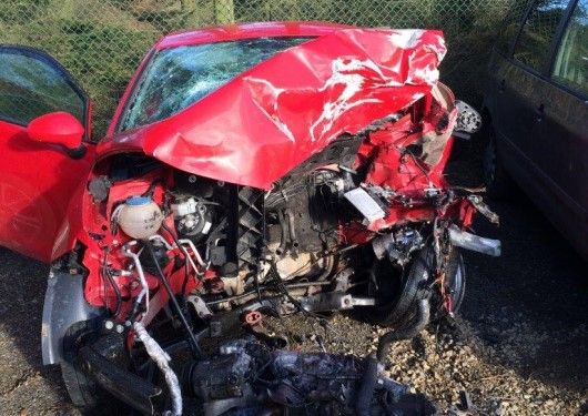 Smashed car after road traffic accident