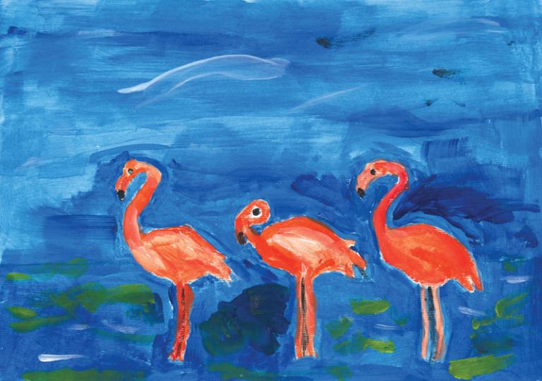 Three flamingos against a blue background